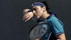 tearful-jabeur-overcomes-breathing-problems-to-win