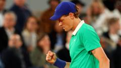 sinner-overcomes-late-wobble-to-progress-in-paris
